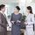 Cheerful Chinese businesspeople talking
